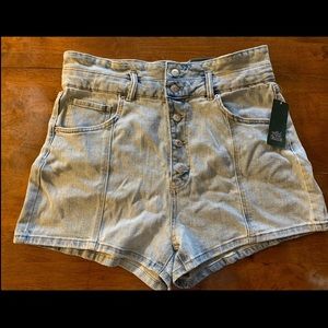 Junior size 16, button fly washed denim shorts.